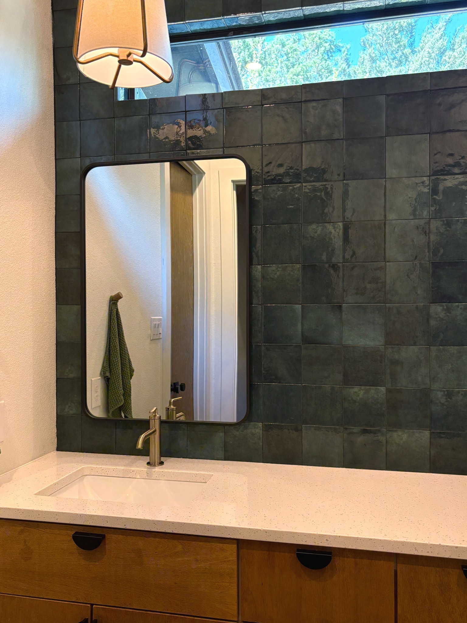 My primary bathroom - green tile, neutral finishes, sources linked here.

#LTKHome