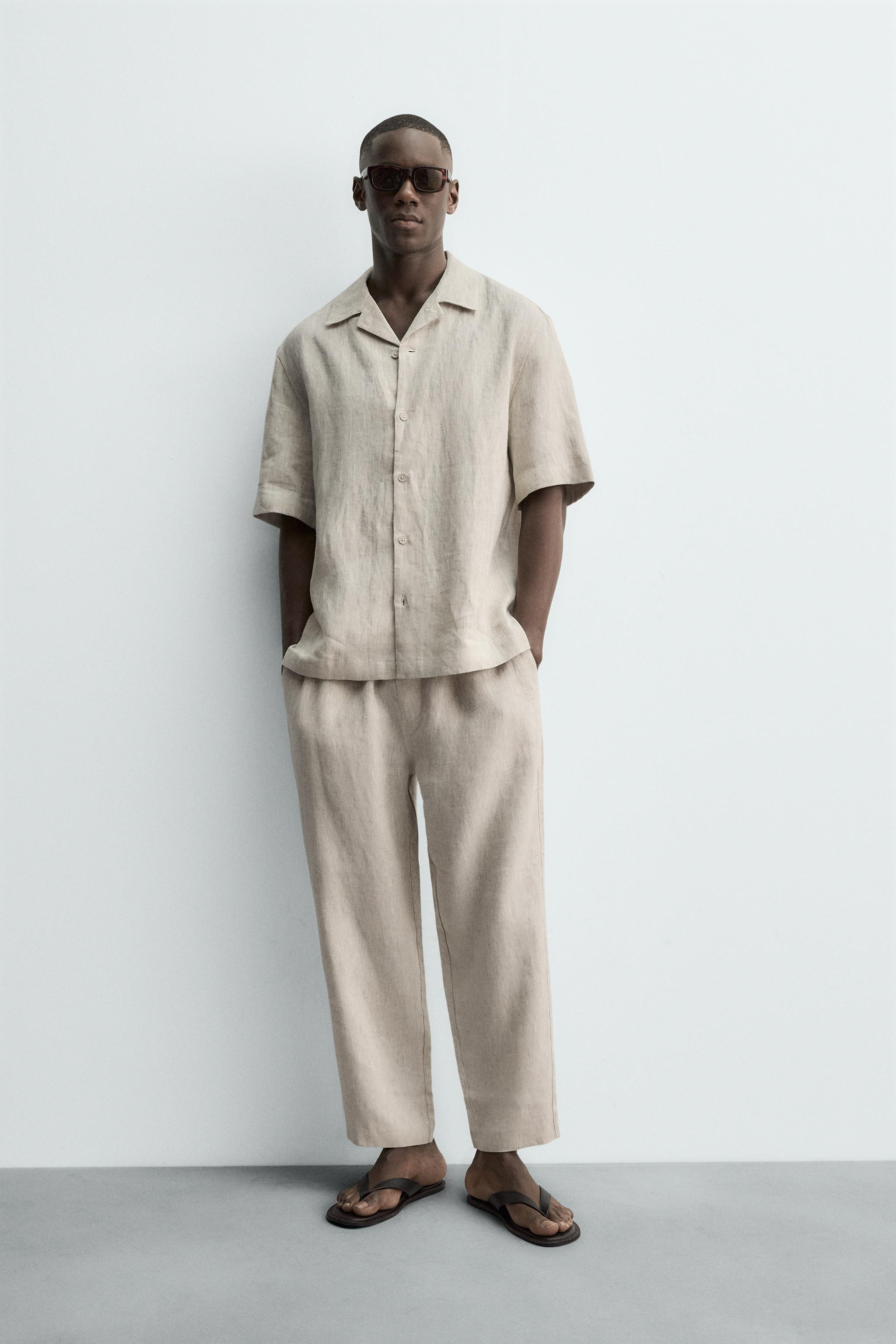 Model height: 188 cmRelaxed fit trousers made from linen fabric. Featuring an elasticated waistba... | Zara US