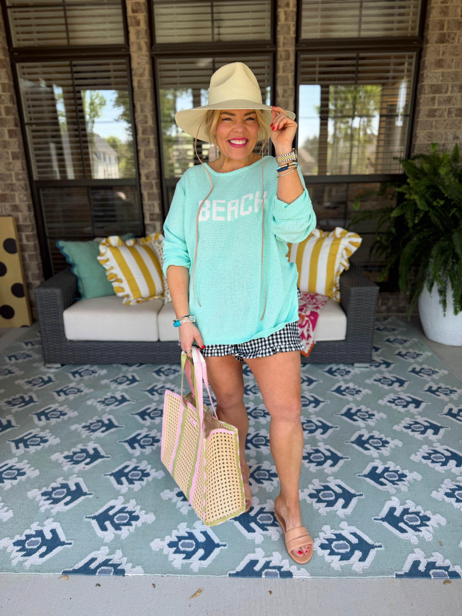 Nothing says beach day like a mint sweater and gingham ruffles!🏖️ I’m completely obsessed with how this tote ties the whole look together—it’s the cutest touch for a day by the water! 🌊👜 

 #LTKgrwm #LTKootd #LTKSeasonal