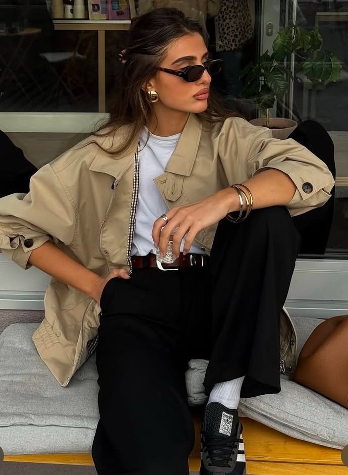 Crop trench coat 
White shirt 
Brown belt 
Black pants 
Black adidas sneakers 
Gold chunky earrings 

#LTKSaleAlert #LTKPetite #LTKStyleTip