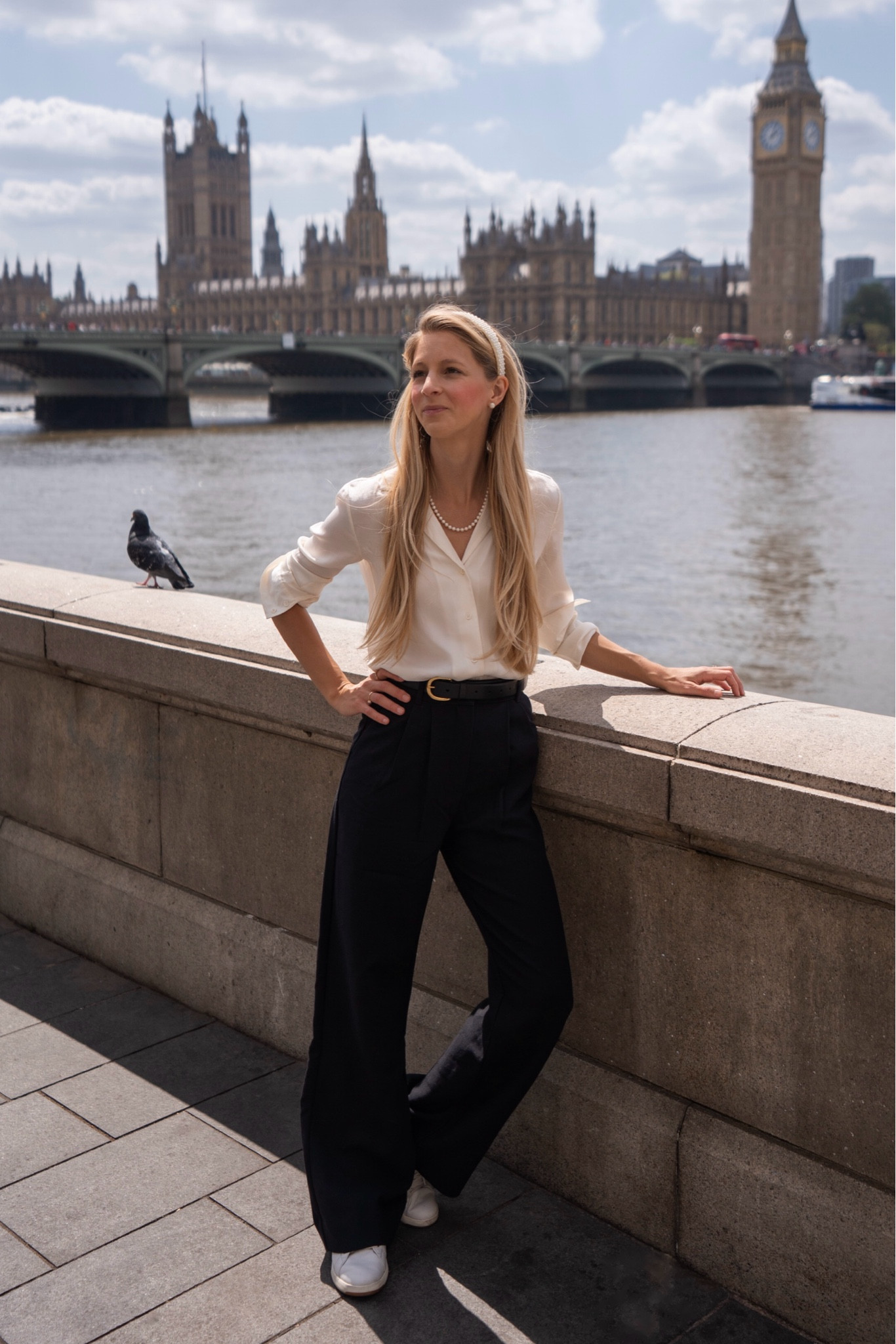 Travel outfit - Europe outfit - London Style - trouser pants & cream silk top makes the perfect classic outfit. Add a pearl headband and necklace to elevate the look even more. 

Also, these Cole Haan tennis shoes are an absolute must for no matter where you are traveling. You can walk forever in them and they go with everything: shorts, dresses, pants, skirts you name it!

Easy for travel Keep it casual or dress it up.

Pair it with a classic trench coat and your favorite bag.

I go one size up in the Abercrombie Sloan Pants

Travel outfit, spring outfit, summer outfit, silk top, silk button down, feminine style, black pants, black trousers, wide leg pants, travel style, summer outfit, spring outfit, fall outfit, rainy day outfit, Europe outfit, classic style, what to pack for Europe, London outfit, European style, what to wear in London, United Kingdom, pearls, what to wear in Europe, chic style, timeless, preppy, what to pack, Europe vacation, Parisian style, French style

#LTKStyleTip #LTKTravel #LTKFindsUnder100