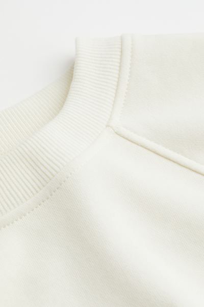 Sweatshirt mit Motiv | H&M (DE, AT, CH, DK, NL, NO, FI)