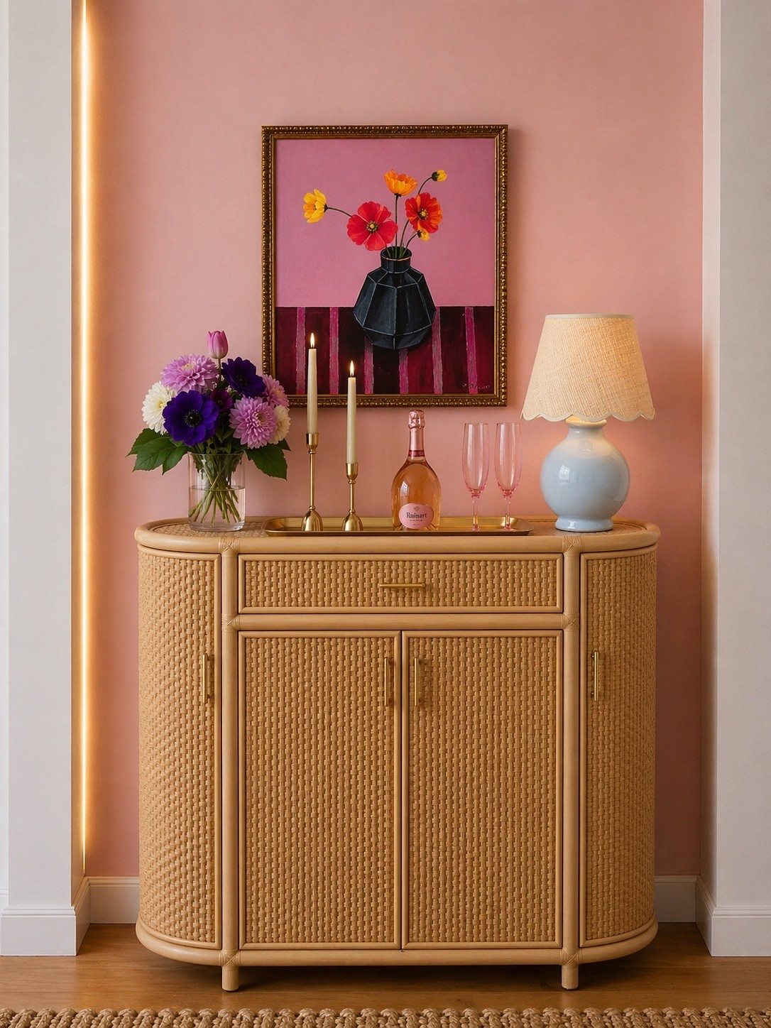 Weekend plans can be this simple—open the home bar, pour something you love, and enjoy the evening without going anywhere.

This rattan bar cabinet adds warmth and texture while keeping glassware and bar essentials beautifully organized. Styled with soft lighting, fresh flowers, artwork, and pink glassware, it turns an unused corner into a polished place for a relaxed Friday night at home.

#HomeBar #BarCabinet #RattanFurniture #WeekendAtHome #CocktailHour #HomeEntertaining #Barware #TableLamp #WallArt #FlowerArrangement #PinkGlassware #LTKHome

#LTKdayinmylife #LTKHome #LTKSaleAlert