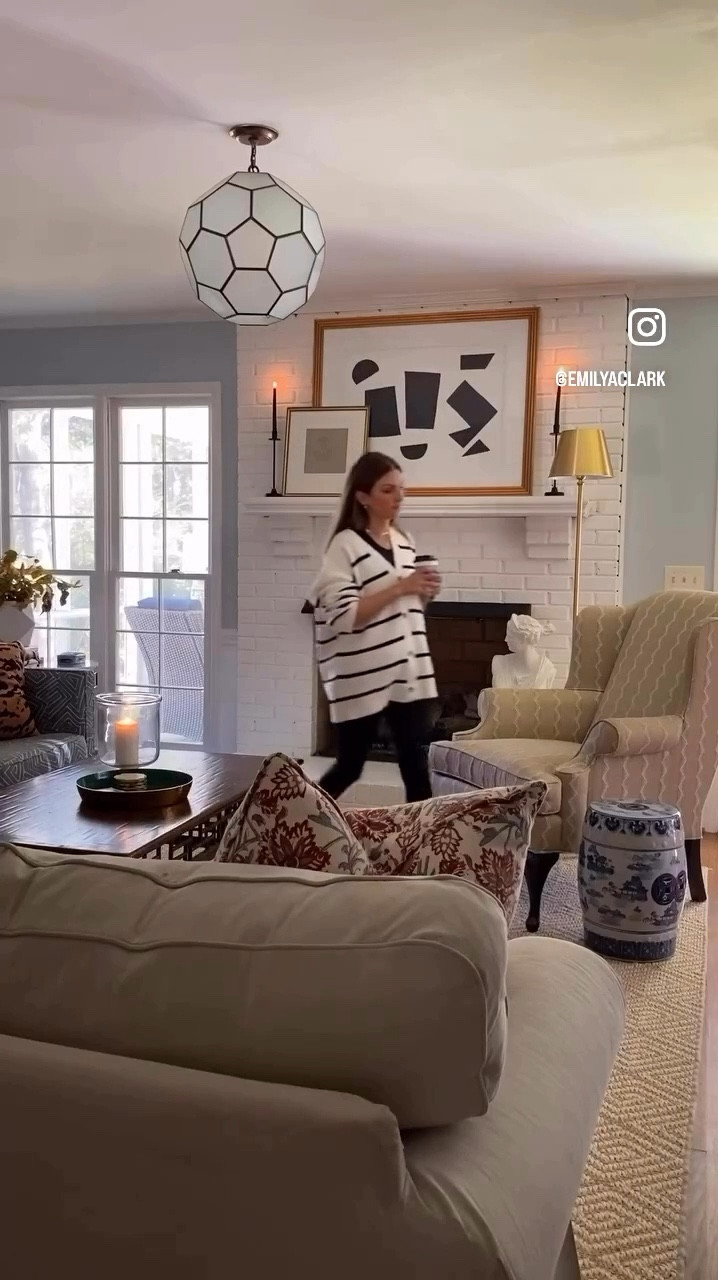 Cozy home decor, fall living room accessories 

Lamp, leaner floor mirror, Blue and white jars, vase, stripes, sisal rug
