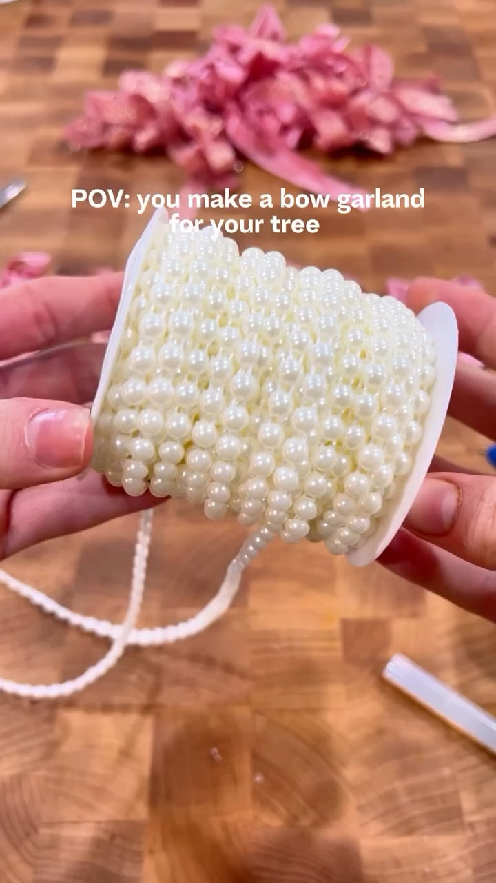 Share with a bow loving girlie 🎀 Are you team traditional or untraditional colors? Comment BOW and I'll send you all the supplies I used for my tree. 

When I found this pearl garland at @michaelsstores I knew I wanted to recreate the Love Shack Fancy x Pottery Barn bow garland. 

I made lots of little bows (see tutorial a few reels back) and hot glued them on the small pearl garland. 

Michaels had a gorgeous bow topper, pink velvet and irredecent ornaments🎀

Follow @michaelsstores and share your creations with #MakeItWithMichaels #MichaelsMakers #EverythingToCreateAnything 

#loveshackfancy #bowgarland #pinkchristmas

#LTKSaleAlert #LTKHoliday #LTKSeasonal