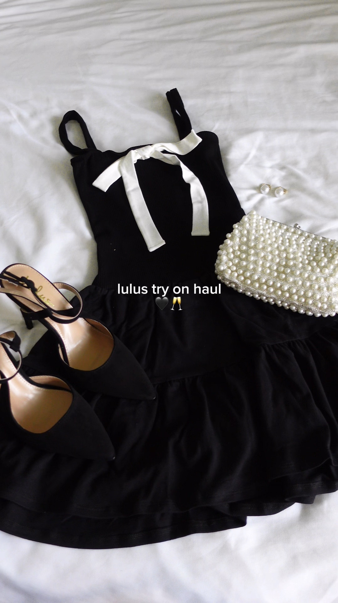 Head to toe from lulus 🖤 this dress is simple yet so cute! Thick ribbed material so it’s super comfy

Wearing size Small in dress, true size in shoes

Lulus pearl clutch little black dress mini dress party dress wedding guest dress 