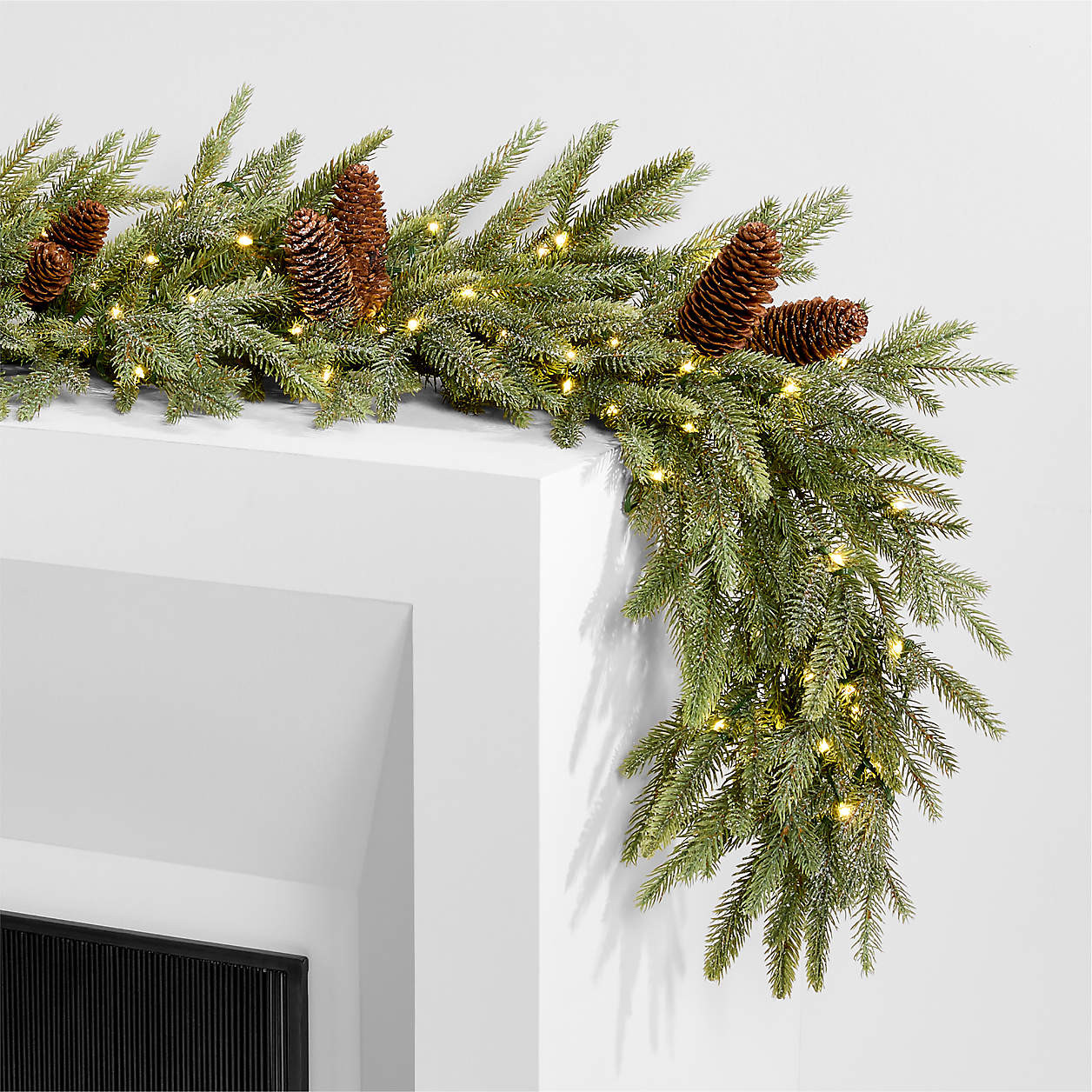 Faux Frosted Pre-Lit LED Norway Spruce Christmas Garland 6' + Reviews | Crate & Barrel | Crate & Barrel