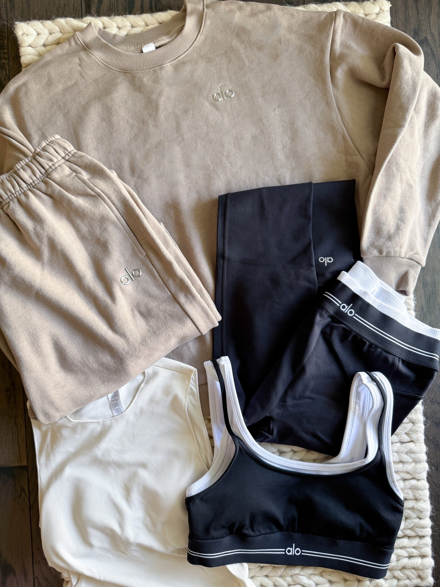 Neutral Alo haul because I’m in my “I’m going to yoga but also to Trader Joe’s right after” era. Their lounge sets hit every time, oversized, comfy, but still pulled together. I wear a small in everything but always size up to a medium in the sweatshirts for a baggier fit + my husband can wear them too. Easy staples that actually get worn on repeat.

alo yoga haul – neutral alo yoga – alo sweat set – yoga to errands outfit – alo varsity bra – alo ribbed tank – comfy cute loungewear – oversized yoga sweatshirt – travel day outfit alo – matching alo set – alo outfit inspo – everyday athleisure look – minimal athleisure style – neutral activewear picks – alo size guide

#LTKActive #LTKU #LTKSummerEdit