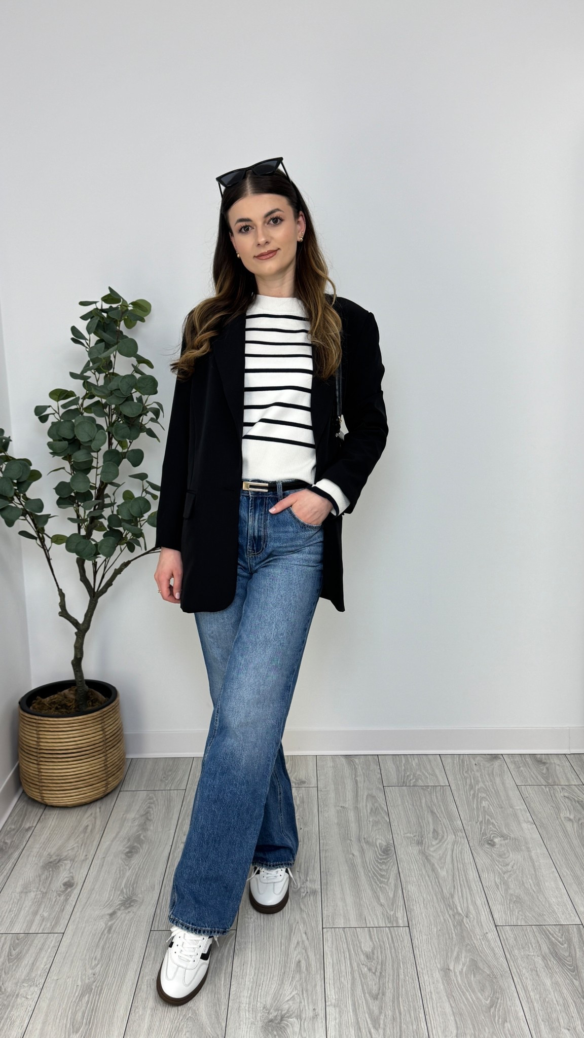Blue wide-leg jeans, white striped jumper, black blazer, white sneakers, black belt, black purse, sunglasses. A classic mix of effortless style and Parisian charm 🤍🖤 #IlaStylesDiary 

#LTKworkwear #LTKspring #LTKeurope