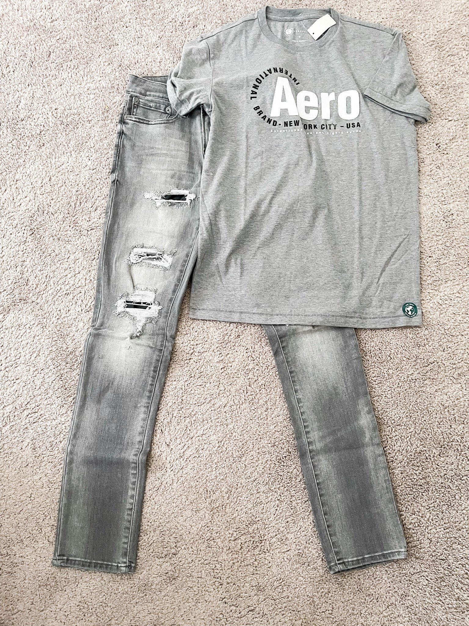 Teen boy outfit idea. Grey tee with grey washed distressed jeans. Back to school clothes. Back to school outfit for boys. Back to school outfit for teen boys  

#LTKBacktoSchool #LTKunder50 #LTKmens