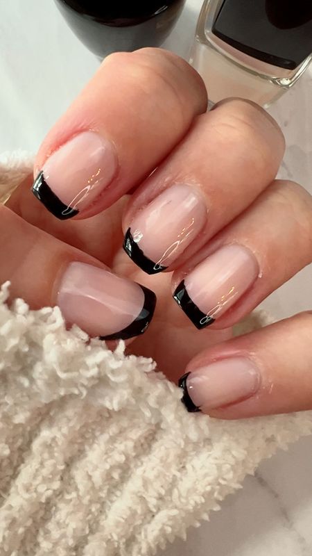 DIY black tip nail design

OPI nail polish | fall nails | at home manicure | September nails | fall nail ideas | black nail polish | Neutral nails


#LTKunder50 #LTKbeauty #LTKstyletip