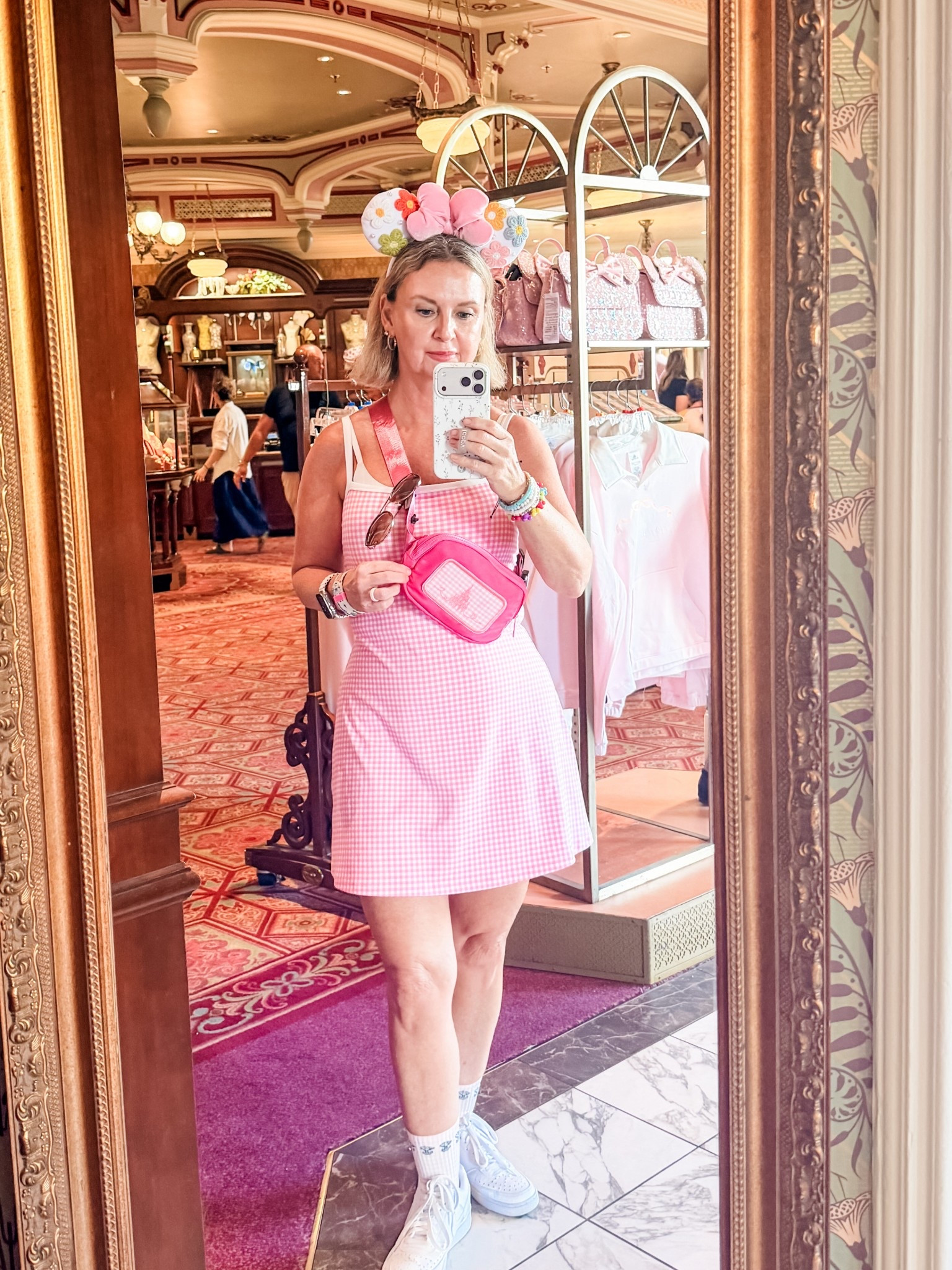 Pink Gingham  Disney OOTD 🎀
Grandma edition 💗
• Pink gingham dress — Target
• Embroidered Minnie ears — Etsy
• Pink belt bag — DIY (base bag from Hobby Lobby + embroidered patch)
• Piglet crew socks — Walmart
• White park sneakers — 
• Colorful bracelet stack — Amazon

@Target @Etsy @DSW 