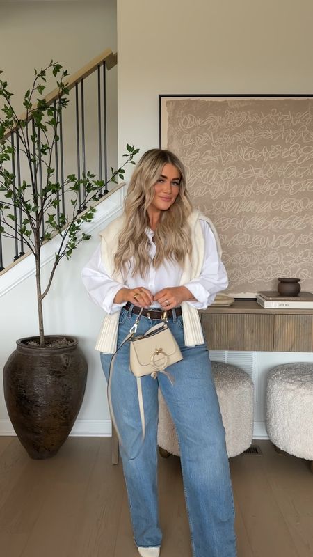 Same base, two ways — Millennial & GenZ 🤍 DAY 3!!
If you’re looking for a pair of jeans that are the most versatile wash + fit, these are ittttt sister. They’re a high rise but looser cut & super flattering. 

Sooo much fun styling this plain white button down — just don’t get yo self tanner on it 😂

Button down // large 
Jeans // 31 regular 
White tank // large

#midsize #midsizestyle #stylingbasics #millennial #genz #size10fashion #whitebuttondown #howtostyle 