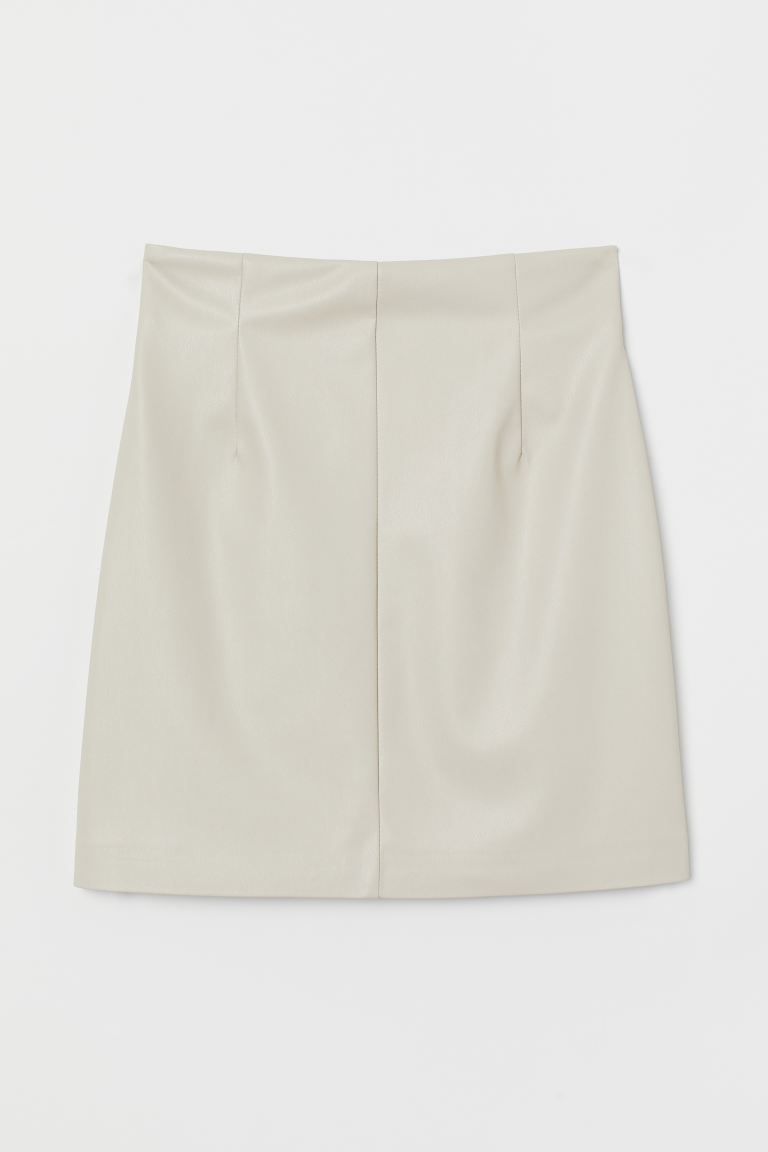 Short skirt in faux leather with a high waist. Concealed zipper at back. Lined. Polyurethane cont... | H&M (US + CA)