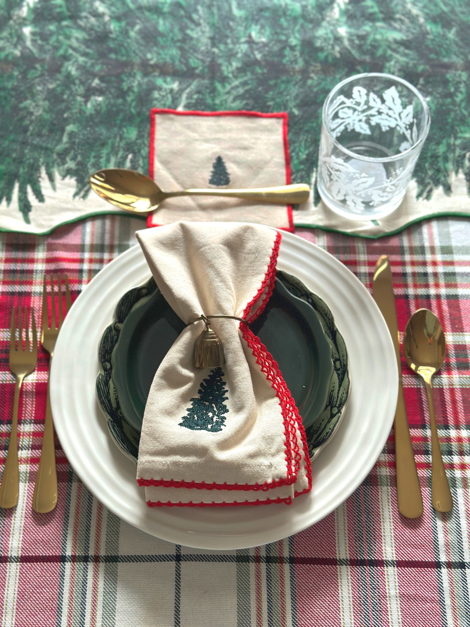 Christmas table setting setting with my pieces I gather from Target’s Christmas collections this year including Hearth and Hand and John Derian. 
Also this set of gold flatware I found on Amazon! SUCH a great price for this high quality Holiday look! I love it! 

#LTKHome #LTKCyberWeek #LTKHoliday
