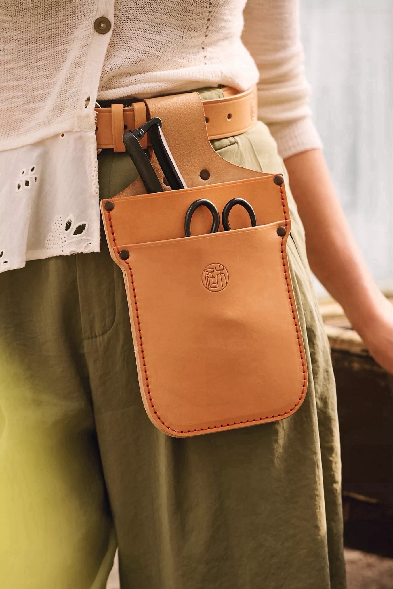 🌿✨ Perfect Gift for Green Thumbs! 🌿✨

Elevate your gardening game with Niwaki’s premium tool set designed for the dedicated gardener. This set includes garden snips, secateurs, a stylish leather belt, and a durable tool pouch—everything you need for a pristine and flourishing garden.

**Tips for Use:**
1. Avoid cutting wire, metal, stone, plastic, or other hard materials to protect the steel edges.
2. Refrain from twisting or applying uneven pressure.
3. Cut diagonally across branches to slice along the fibers.
4. Wash and dry thoroughly, apply Camellia oil, and store in a dry place.

**About Niwaki:** Inspired by the Japanese term "garden tree," Jake Hobson's Niwaki line embodies simplicity and functionality, offering expertly crafted tools that make gardening a joy.

**Set Includes:**
- Leather belt with metal buckle
- Snips
- Secateurs
- Cotton pouch

Perfect for indoor and outdoor gardening, these tools are crafted in Japan to ensure superior quality and performance. Treat yourself or a loved one to the ultimate gardening experience with Niwaki.

#GardeningTools #Niwaki #GardenGift #GreenThumb #JapaneseCraftsmanship

#LTKSeasonal #LTKHome #LTKGiftGuide