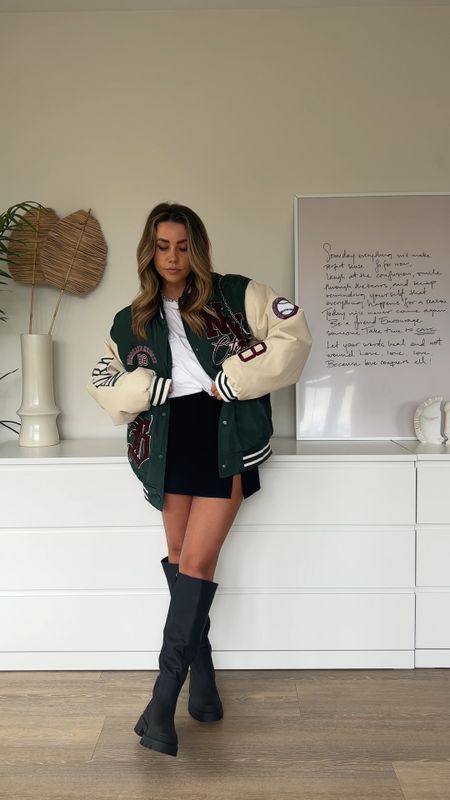 Everyday outfit idea for spring transition wearing varsity jacket with knee high boots 

#LTKstyletip #LTKeurope #LTKunder50