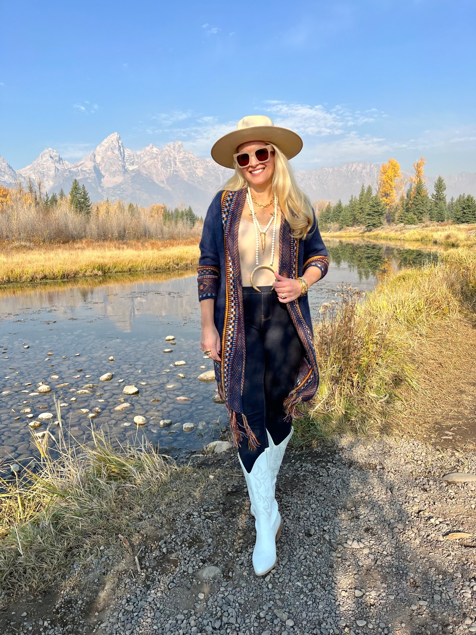 Bringing the boho western vibes with this beautiful sweater cardigan from amazon. It runs big, size down. I’m wearing a small. Those are the Grand Teton mountains in the background in Wyoming!

Sweater cardigan small
Denim leggings large
Cowboy boots size 10

#LTKSeasonal #LTKStyleTip #LTKFindsUnder100 #LTKOver40 #LTKTravel #LTKU #LTKSaleAlert #LTKFindsUnder50 #LTKGiftGuide #LTKHoliday #LTKWorkwear #LTKFamily #LTKActive #LTKMidsize #LTKShoeCrush