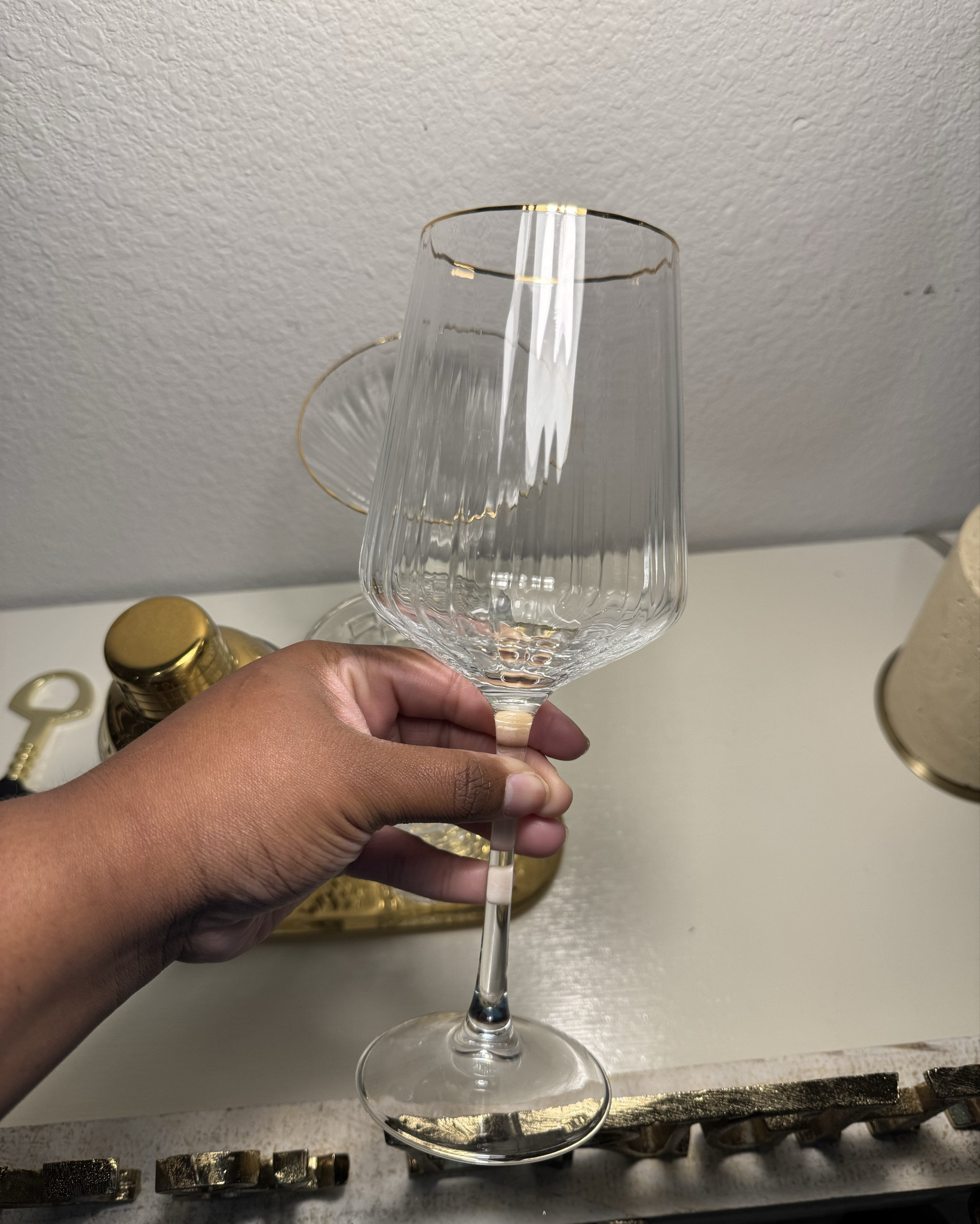 Elegant ribbed wine glasses. Not the exact pair (mine are HomeGoods), but this is the closest match I found with the same tall silhouette, fluted detail, and upscale feel. Lightweight, chic, and perfect for elevating a simple pour. 🍷✨

#LTKFindsUnder50 #LTKHome