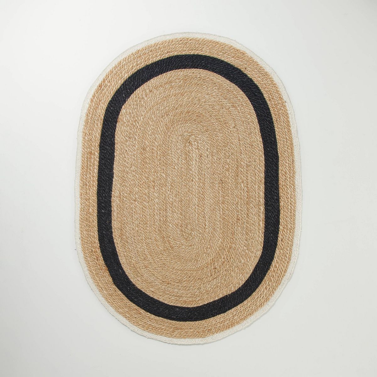 Oval 5' x 7' Bold Stripe Braided Jute Area Rug Black/Tan/Cream - Hearth & Hand™ with Magnolia | Target