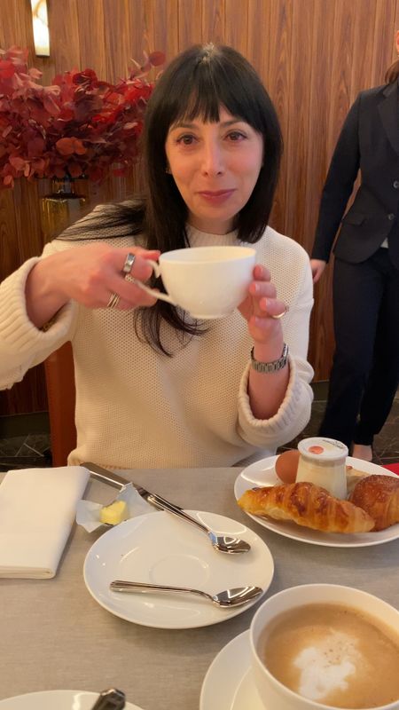 Coffee and croissants 🥐 in Paris wearing the Everlane waffle sweater in cream size small. 

#LTKstyletip #LTKover40