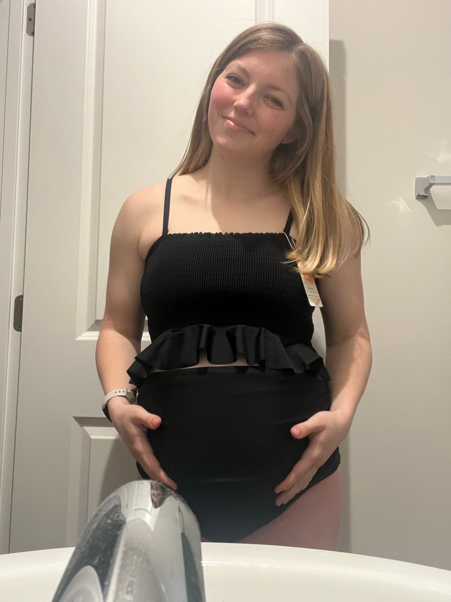 Pregnant summers feel impossible without a swimsuit you feel good in…this black two-piece is so flattering and easy to get in and out of! (I’ve kept using the top postpartum with different bottoms.)

(5’2.5”, Size L)
#MaternityFaves

#LTKBump #LTKmomlife #LTKSwim