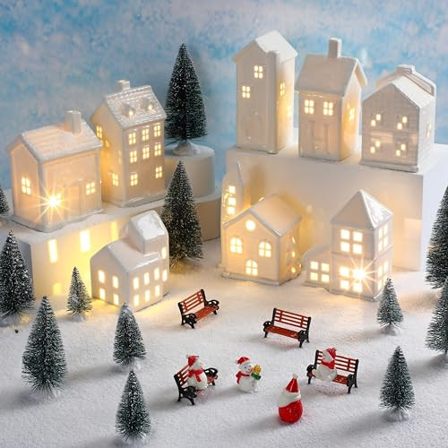 Soaoo 29 Pcs Ceramic Christmas Village Set 8 Led Christmas Village Houses 12 Christmas Trees 4 Christmas Snowmen 4 Benches and Fake Snow; White Porcelain House Xmas Tabletop Scenes Decoration | Amazon (US)