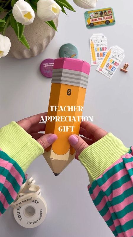 Teacher Appreciation Gift ✏️✨

Fill these cute pencil boxes with anything you think your child’s teacher may enjoy.  I included my fav @oliveandjune mani 💅🏼 products for a quick mani anywhere, new Rifle Paper Co Pens @target, @alani on the go energy drink powder, and of course a gift card!  

If you have a child in elementary or preschool adding this meaningful book (have your child sign the inside) is an extra special addition.  

Wrap with themed ribbon and tag 🏷️ 

#teachergift #teacherappreciationgift #teachers #gift #teacher #giftsforher #giftbox #giftguide 

#LTKGiftGuide #LTKfamily #LTKVideo