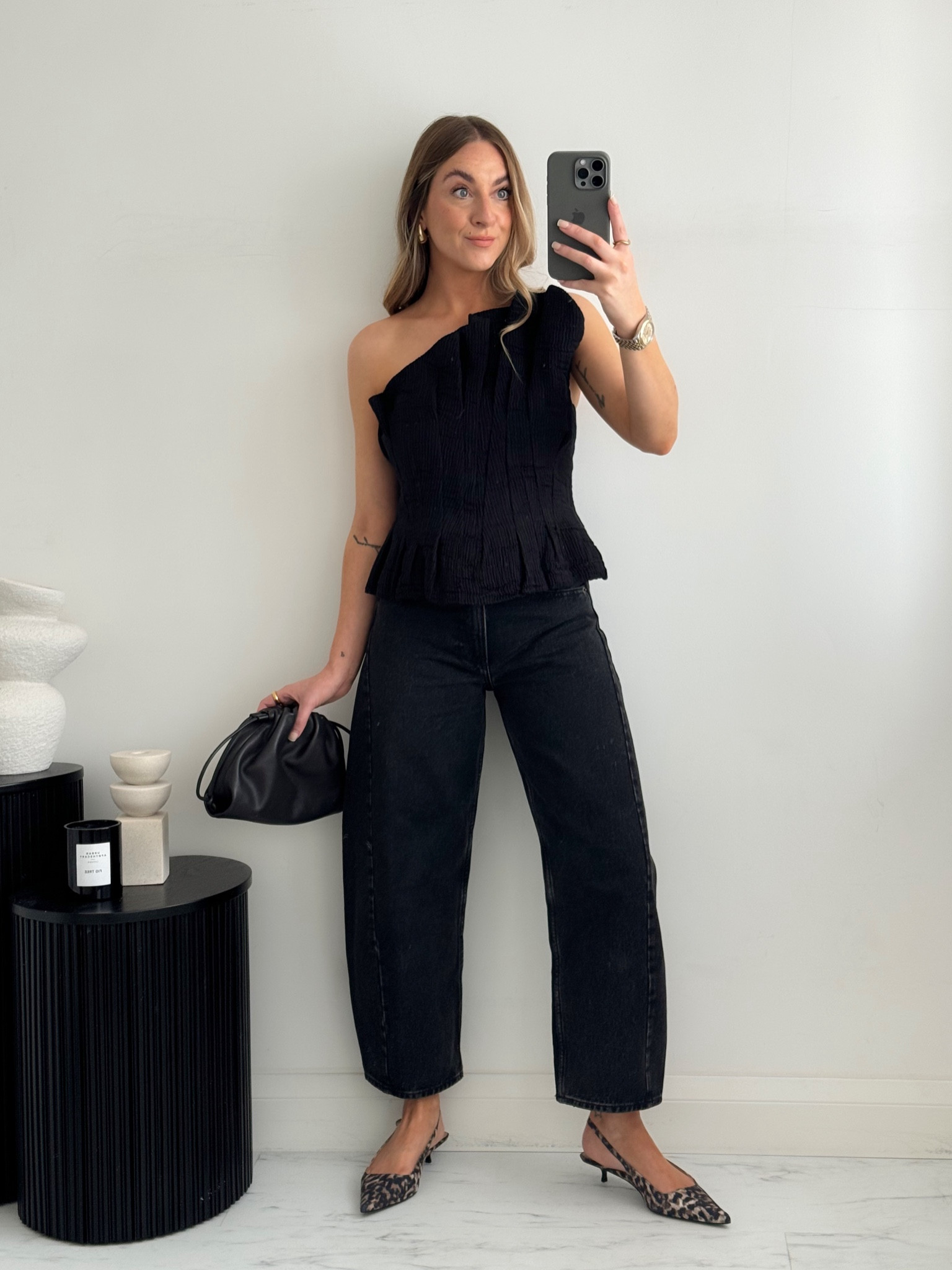 Barrel jeans dressed up for date night with a simple black top & leopard print kitten heels 

#LTKstyletip #LTKshoes #LTKautumn