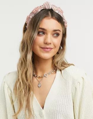 ASOS DESIGN knot headband with pearl flower embellishment in blush pink | ASOS (Global)