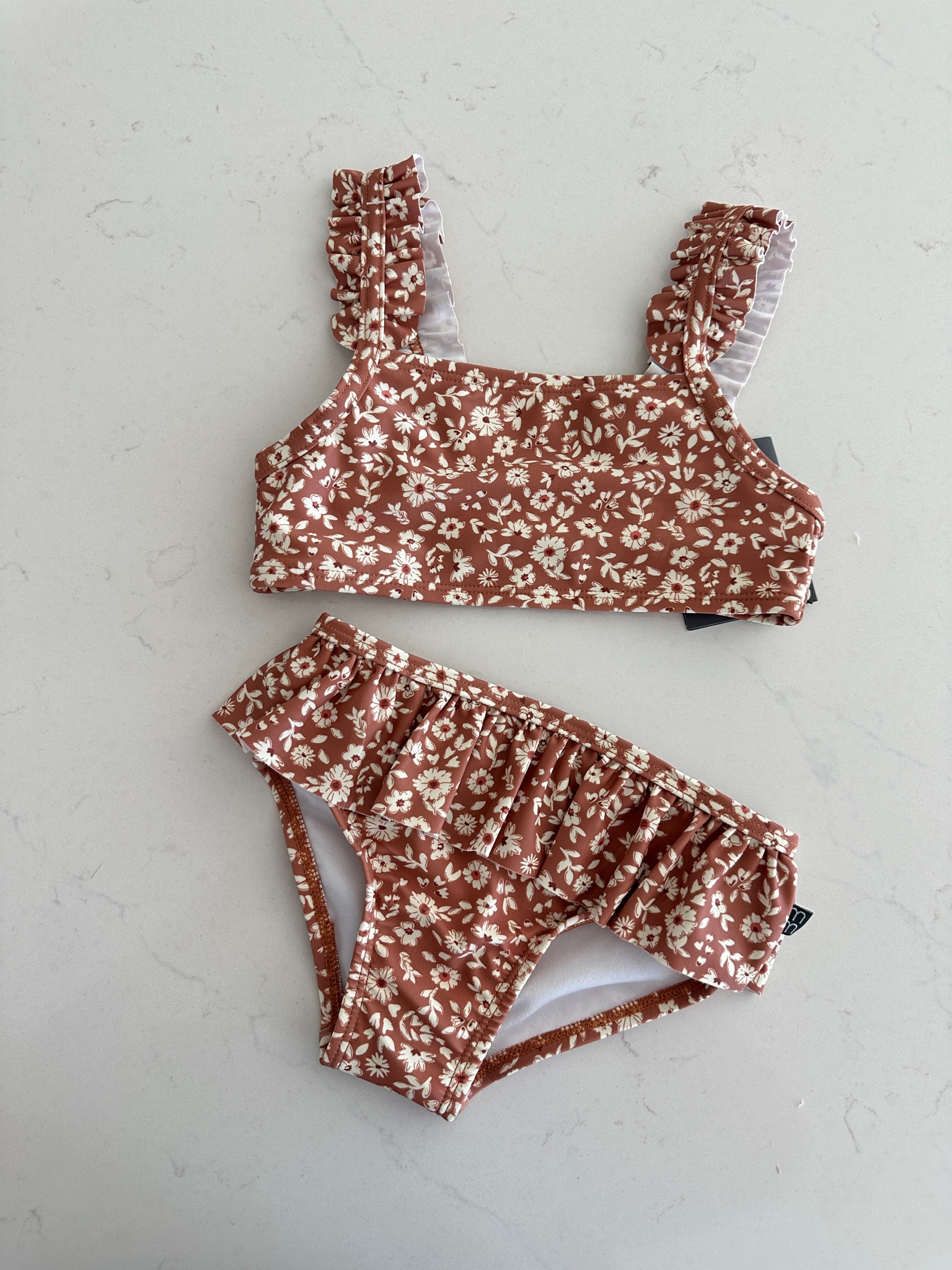 Just got the cutest little floral bikini in for my two year old 😍

#LTKswim #LTKkids #LTKbaby
