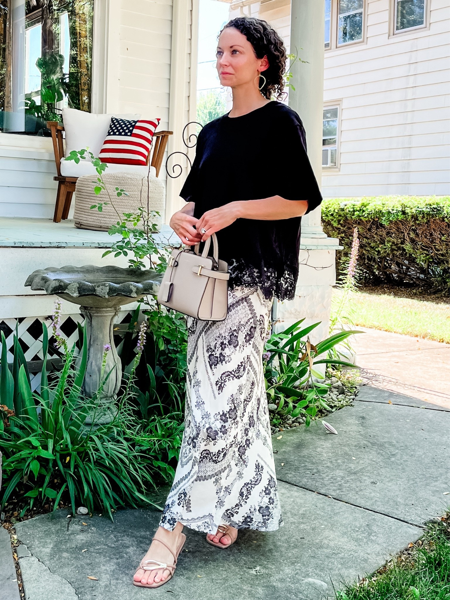 A cotton skirt for summer!
Bandana cotton maxi skirt from Chicwish. 
Black lace t-shirt from Chicwish. 
Gold geometric earrings from Rustic Gem Jewelry. 
Leather handbag from Le Tannuer, old color, linking similar.
Sandals are old from Marc Fisher, linking similar. 
Petite outfit. Neutral outfit. Summer outfit. Modest outfit. Mom outfit.

#LTKmomlife #LTKdayinmylife #LTKOver40