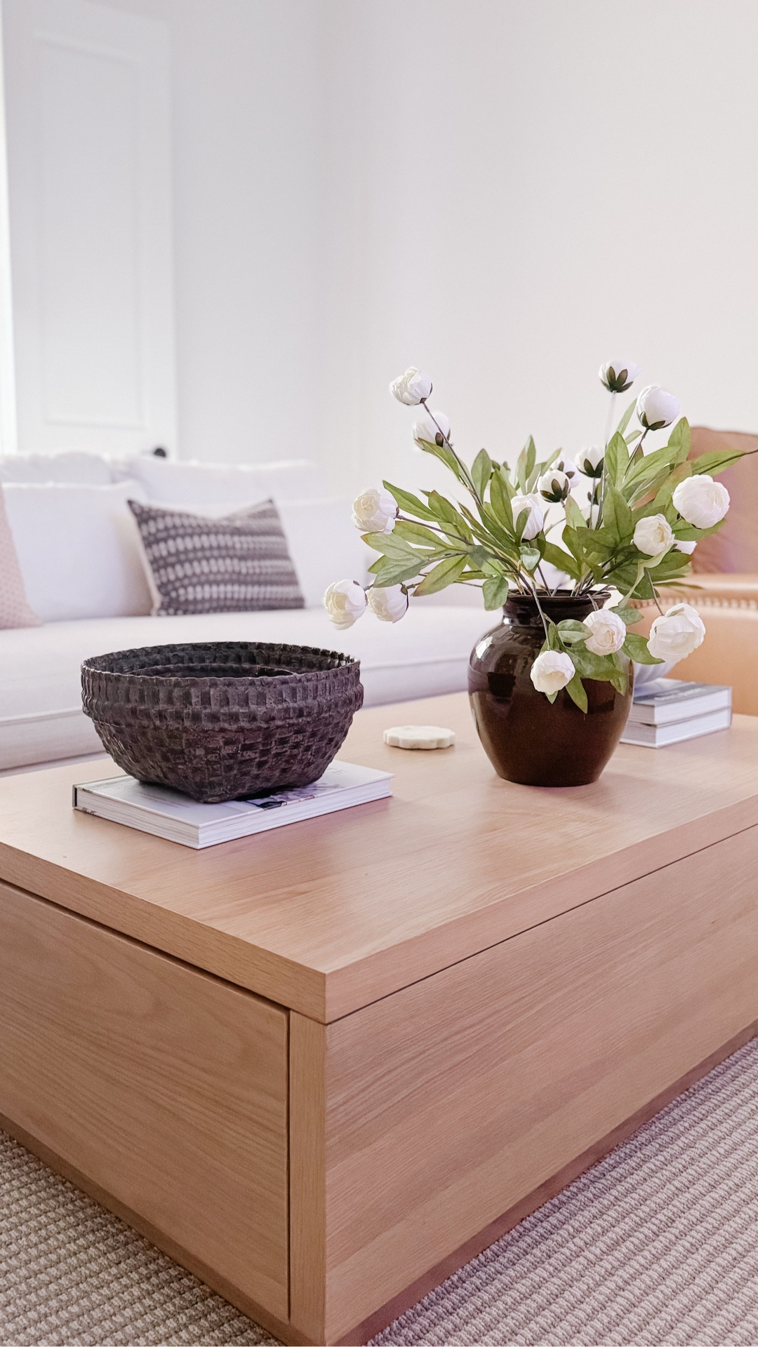 Simple coffee table styling formula using Magnolia and Amazon finds to create a neutral, designer-inspired living room look. Sharing how I layer a wood coffee table with contrast bowls, stacked books, and soft florals for a cozy organic modern space that feels elevated but attainable. Everything linked including the coffee table, decorative bowl, vase, and florals for an easy living room refresh.

#LTKHome #LTKSeasonal #LTKSaleAlert