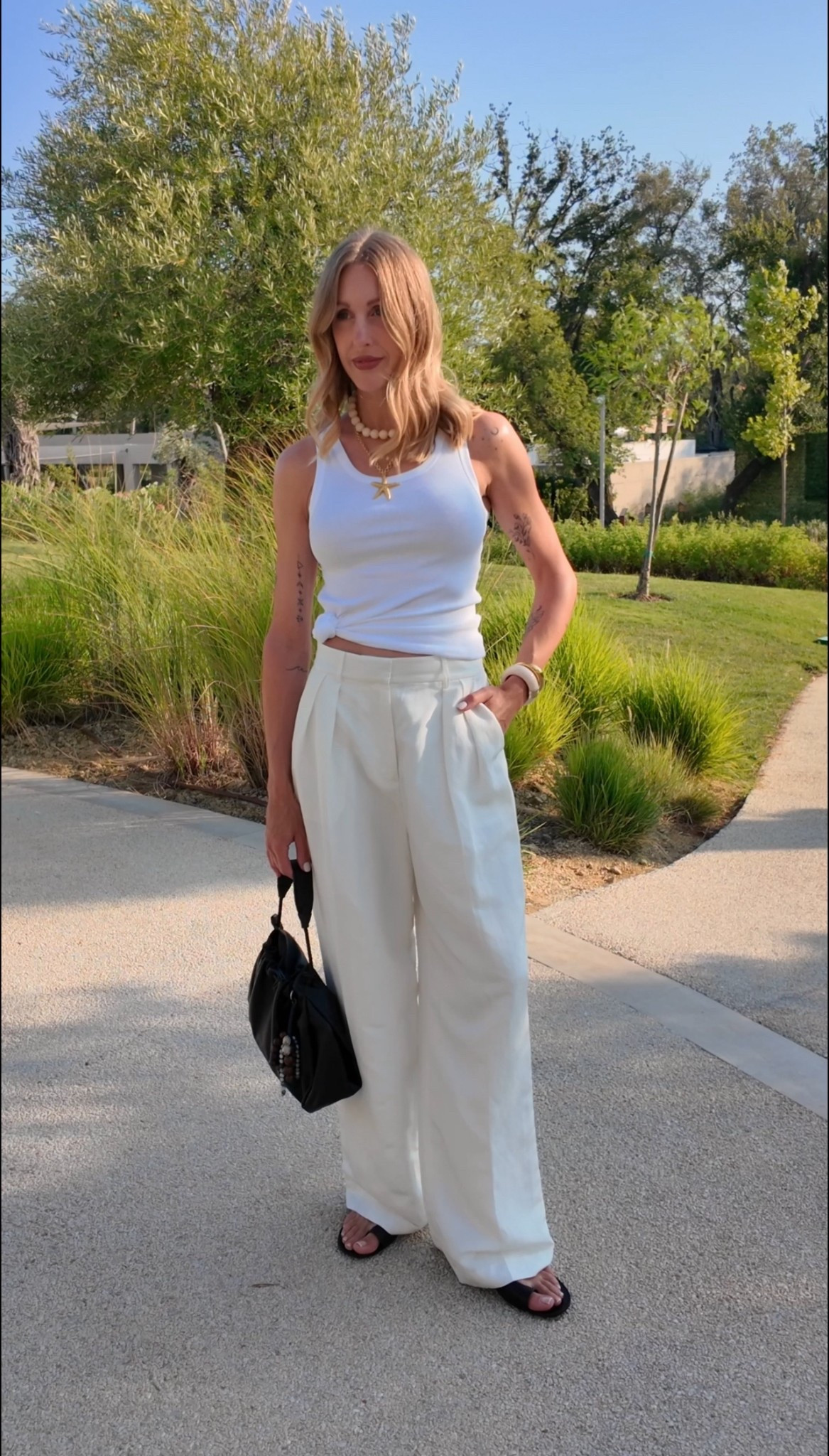 Holiday outfit - white party outfit - summer outfit - cos tank top - wide leg trousers - clutch bag - Starfish necklace - resin bead necklace - Sezane 

#LTKsummer #LTKuk #LTKeurope