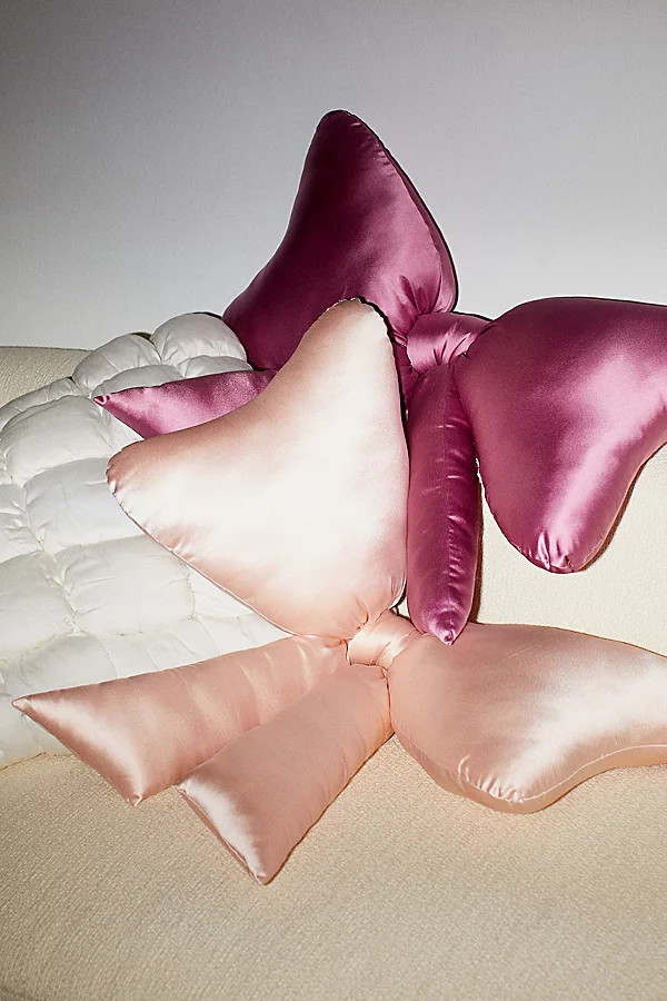 Big Bow Satin Throw Pillow in Ballet Slipper Pink at Urban Outfitters | Urban Outfitters (US and RoW)