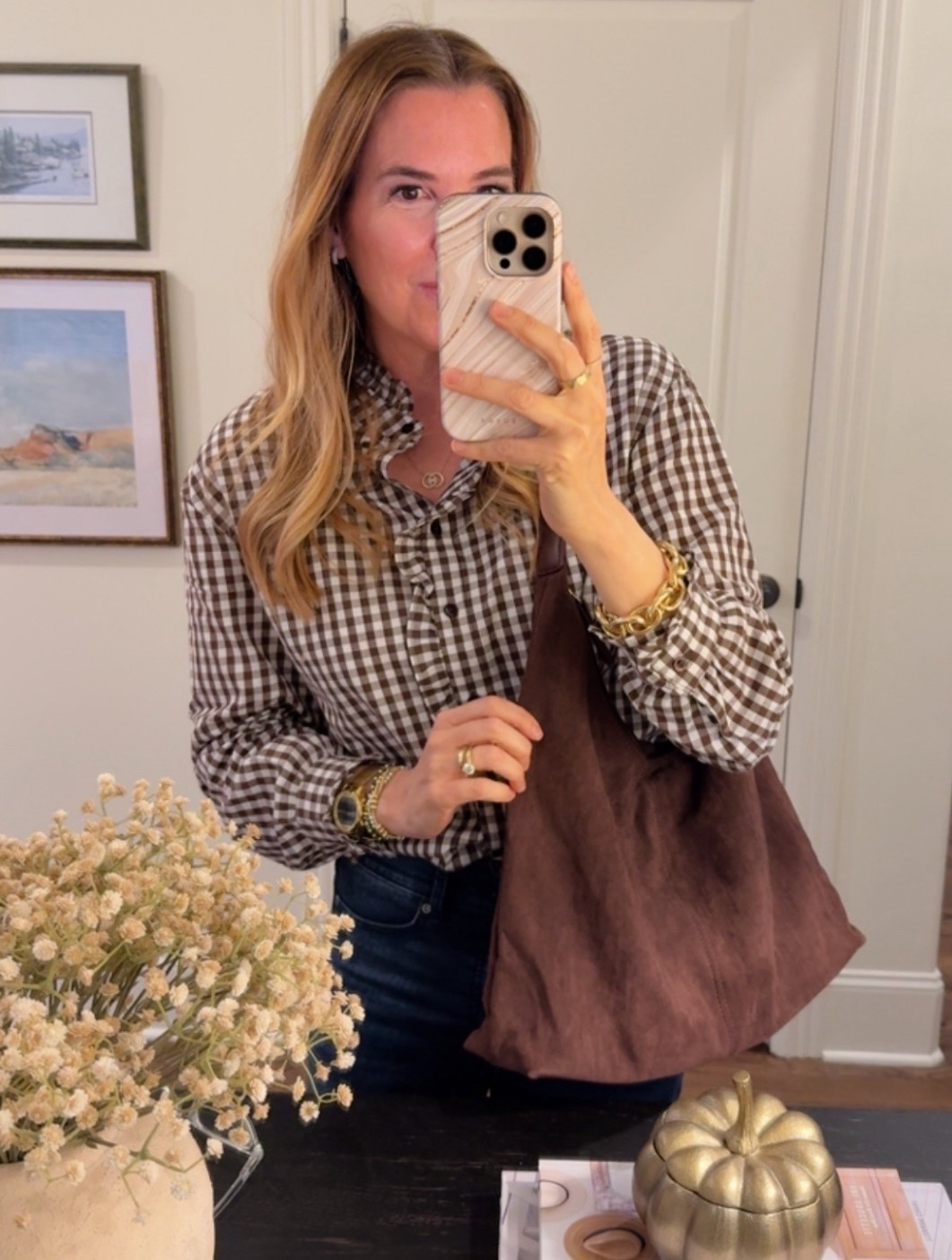 Two favorites. This beautiful gingham button down with ruffled trim and the suede crescent bag, both so good for fall. 🤎