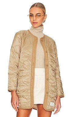 ALPHA INDUSTRIES Long Quilted Liner in Vintage Khaki from Revolve.com | Revolve Clothing (Global)