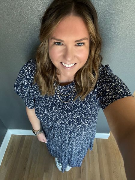 Feels like Spring is here in Dallas which means time to break out some dresses and sneakers. I wore this to actually go get my new car! Super exciting and I loved the simple print and smocked chest on this dress. The sleeve was nice and I tend to like a sleeve this time of year. I paired it with simple gold jewelry and sneakers for a casual look  

#LTKmidsize #LTKshoecrush #LTKSeasonal