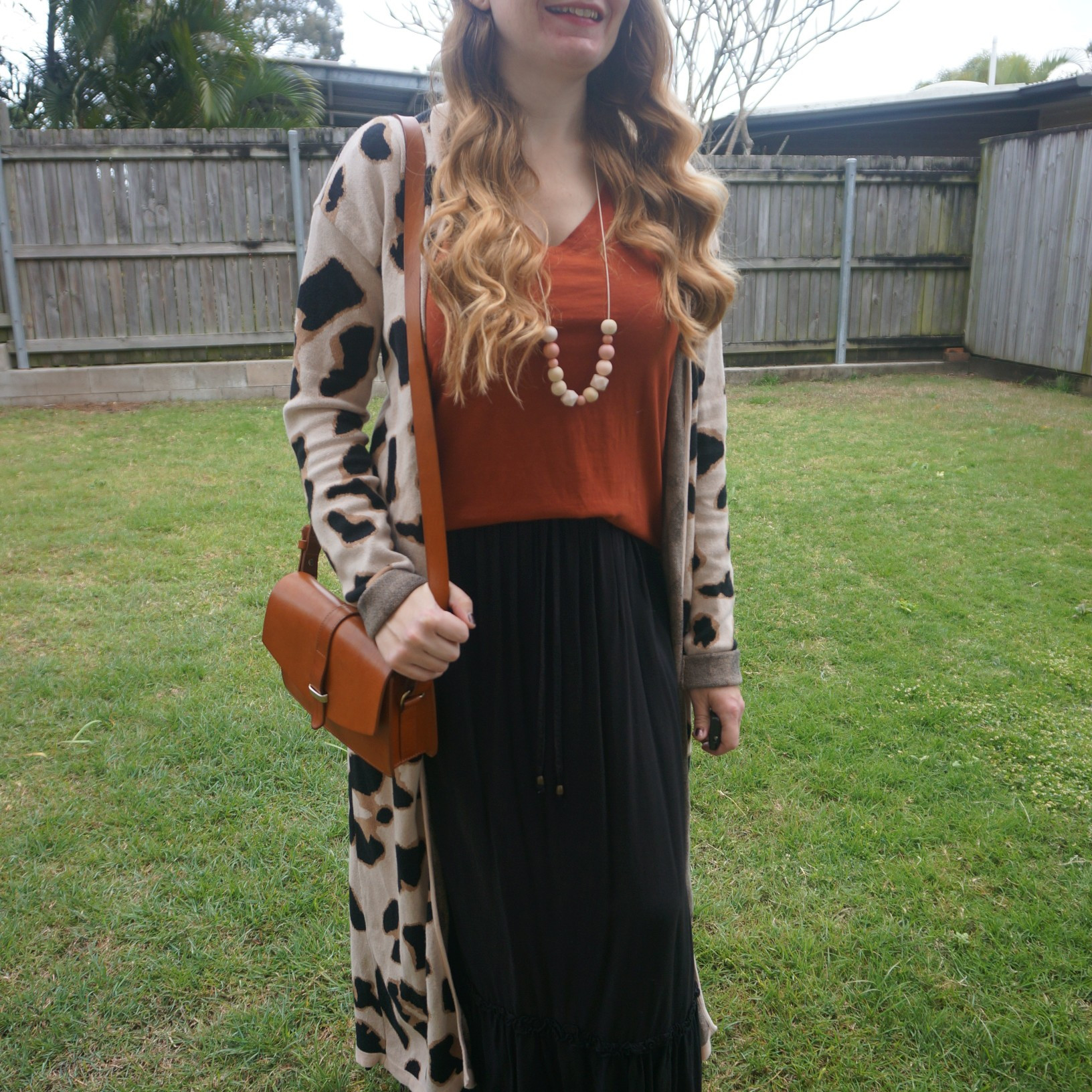 Leopard print duster cardigan with rust tee, black maxi skirt and vintage Sezane bag 🧡

#LTKaustralia #LTKwinter