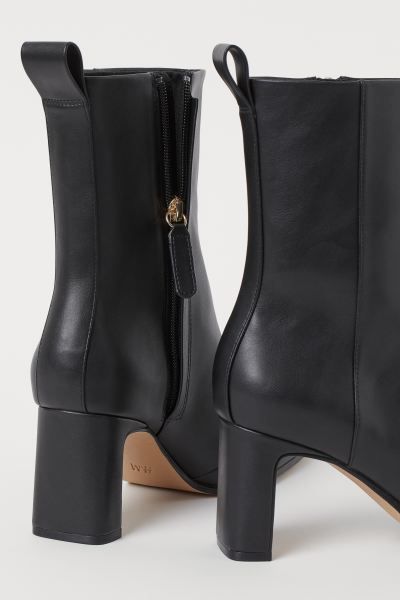 Ankle boots in faux leather with chisel toes. Concealed zipper at one side, loop at back, and cov... | H&M (US)