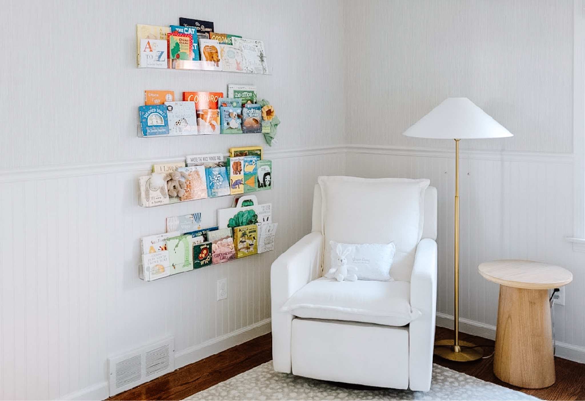 Cozy nursery corner is everything! Absolutely adore these acrylic shelves for all the cute books 

#LTKbump #LTKhome #LTKkids