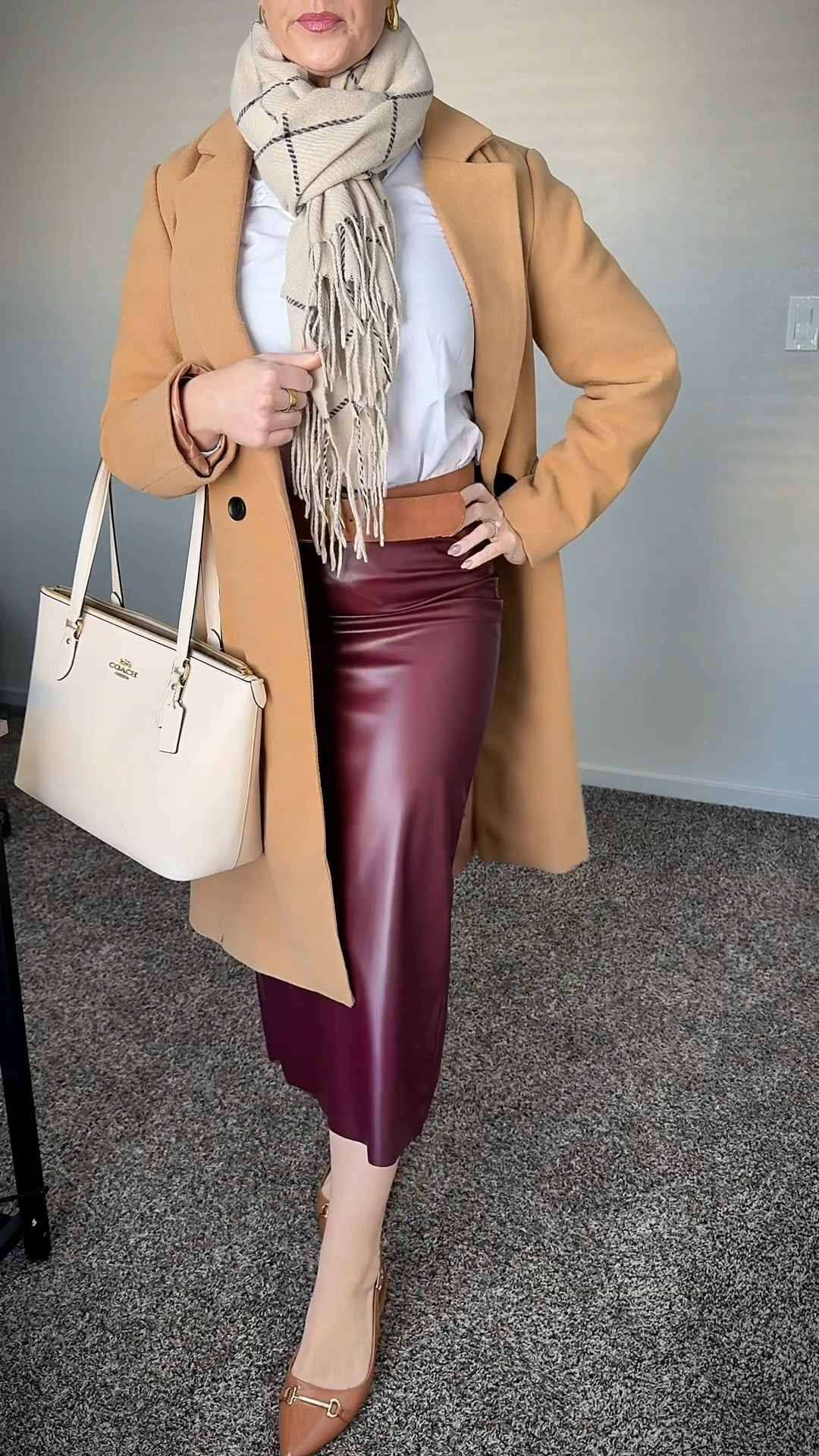 The faux leather midi skirt is a vibe #fauxleather #midiskirt #officestyle 

#LTKootd #LTKWorkwear #LTKgrwm