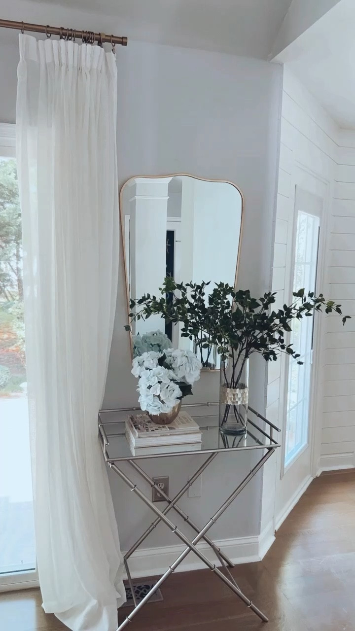 Loving this Spring decor in our dining room and favorite Amazon curtains above our sliding glass door.

Home decor.
Dining room decor.
Artificial tree branches, faux branches, artificial green stems, artificial hydrangea, artificial flower stems, real touch faux hydrangea, coffee table book decor, arched wall mirror, curved wall mirror, gold wall mirror, Studio McGee wall mirror, Amazon drapes, Amazon curtains, pinch pleat curtains, faux linen curtains, semi sheer curtains, curtain clip rings, off white curtain panels, curtains for sliding glass door, dining room curtains, gold curtain rod. End cap curtain rod, warm brass curtain rod, x-leg side table.

#dining room #homedecor

#LTKhome #LTKstyletip #LTKFind