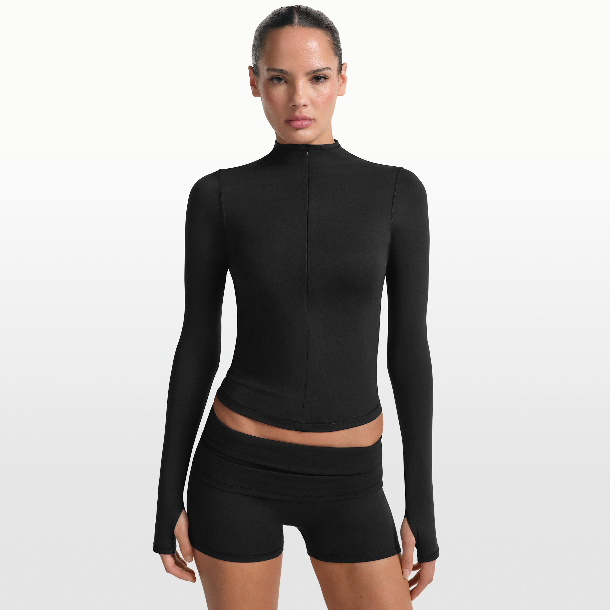 Nike Women's SKIMS Matte 1/2-Zip Mock-Neck Long-Sleeve Top in Black | TPZUP6797W-OBD | Nike (US)