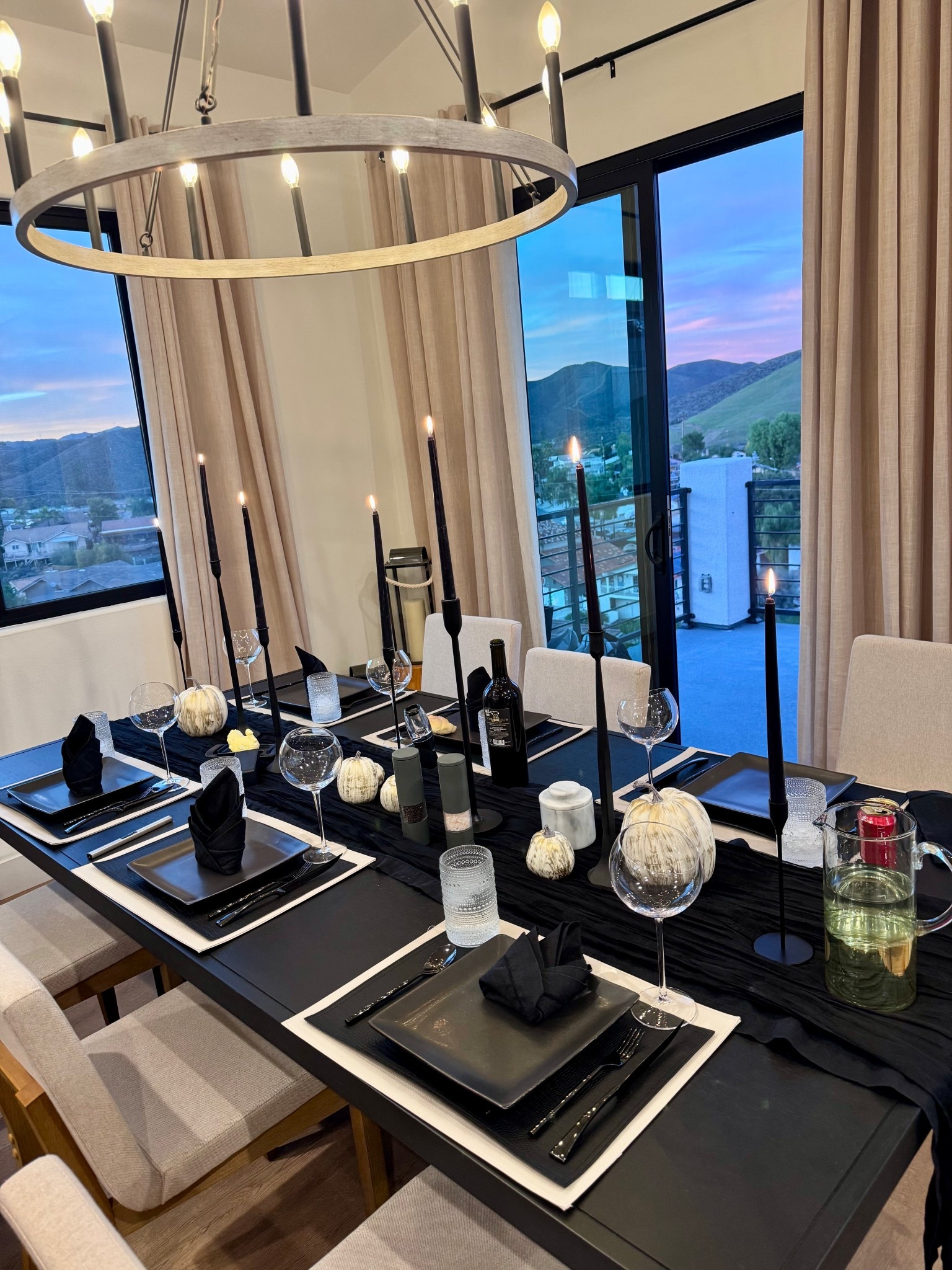 Thanksgiving dinner tablescape 🍁 black | moody | wine glasses | plates | table setting | black silverware | pitcher | candles | pumpkins  

#LTKHoliday #LTKSeasonal #LTKHome