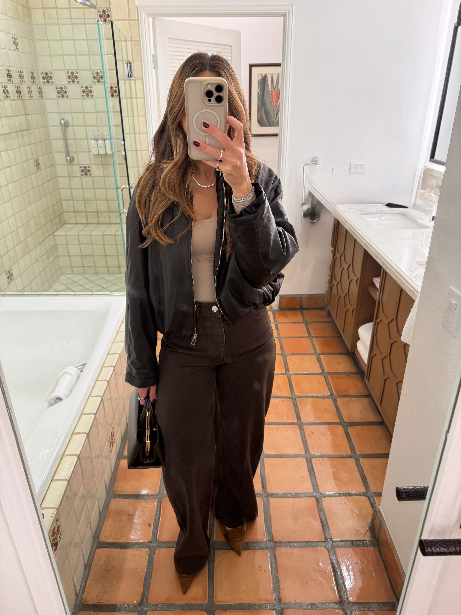 Monochromatic brown outfit 
Brown bomber jacket. Brown jeans. Brown clutch. Thanksgiving outfit 

#LTKHoliday #LTKootd #LTKOver40