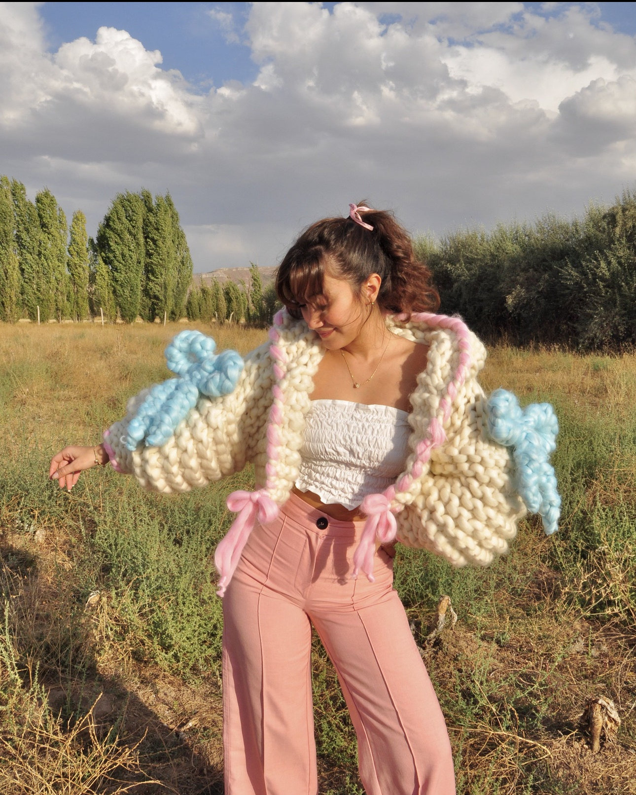 Wrap yourself in cozy magic with this handmade hooded crop cardigan, crafted from ultra-soft 100% Merino wool 💫🧶 With chunky oversized knit texture, pastel tones, and playful Harajuku-meets-cottagecore vibes, this dreamy layer is perfect for chilly mornings, layered looks, and cozy self-expression. Ethically made and uniquely styled for soft girl souls and fairycore hearts.