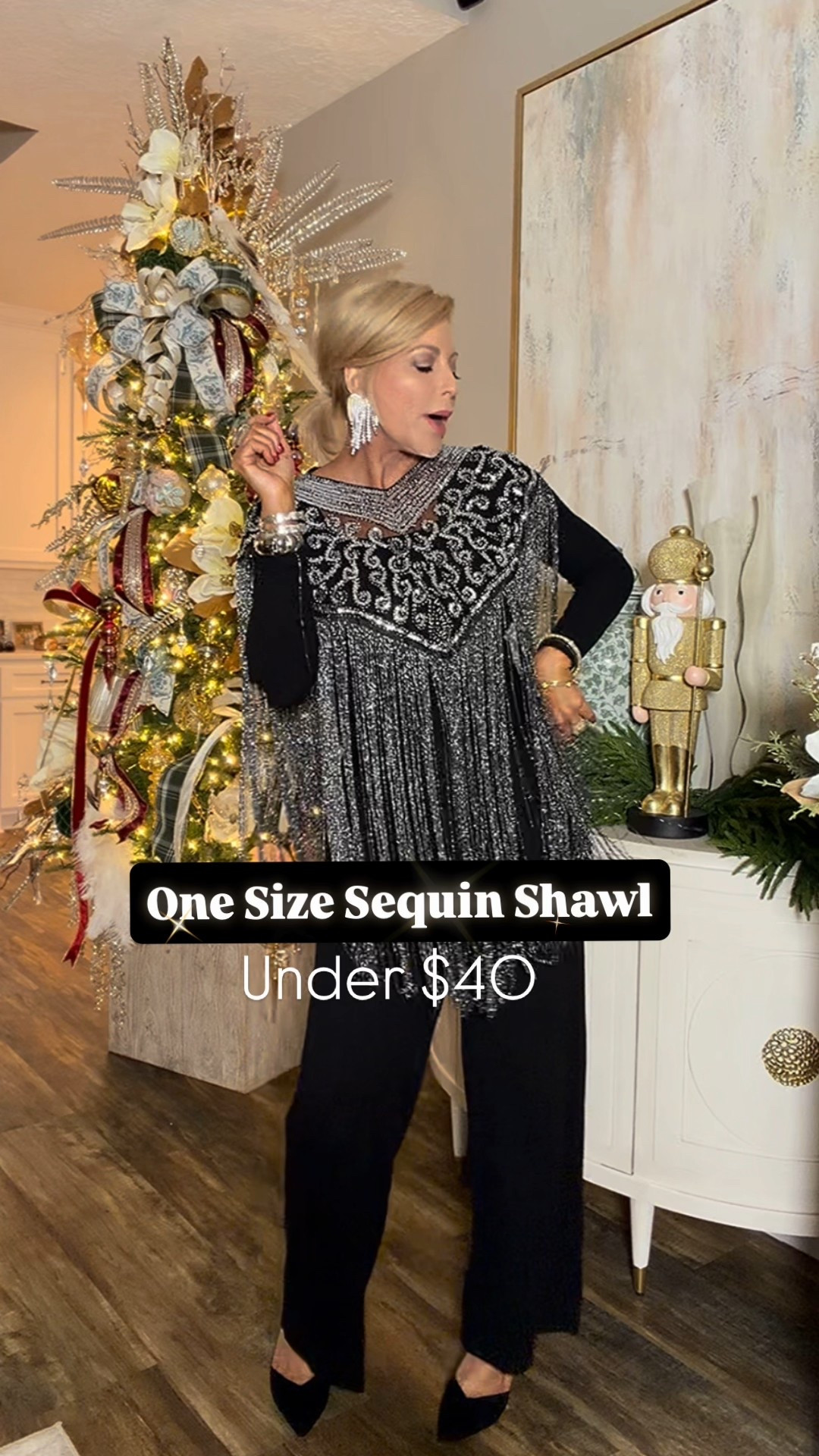 One size sequin shawl/poncho!!  Under $40!! ➡️I’m wearing black silver 

#LTKFindsUnder50 #LTKOver40 #LTKHoliday