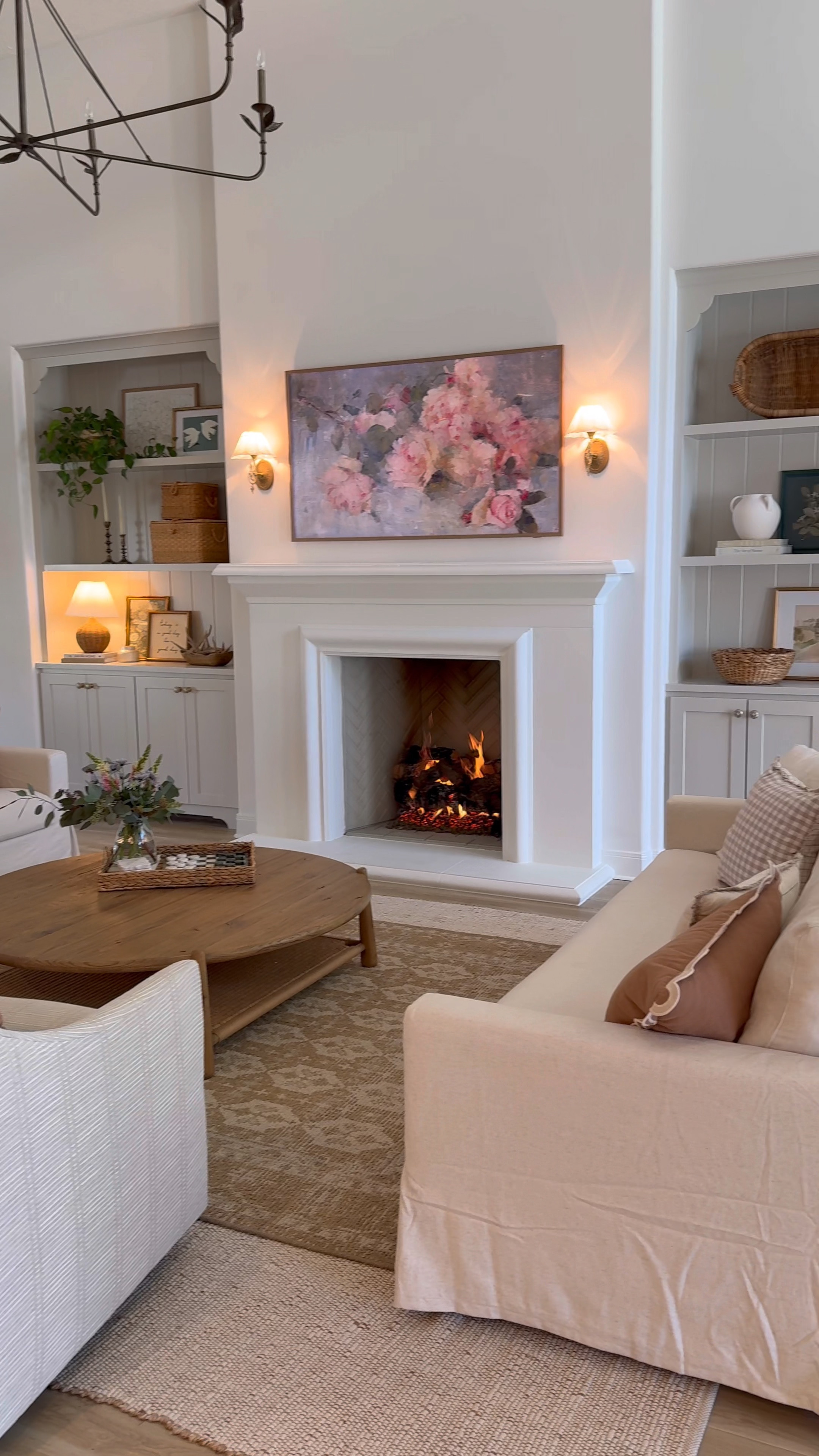 🥹🥹🥹🥹🥹 is this real life 

THEBLOOMINGNEST before and after living room decor rug coffee table pillow art frame tv 

#LTKSeasonal #LTKHome