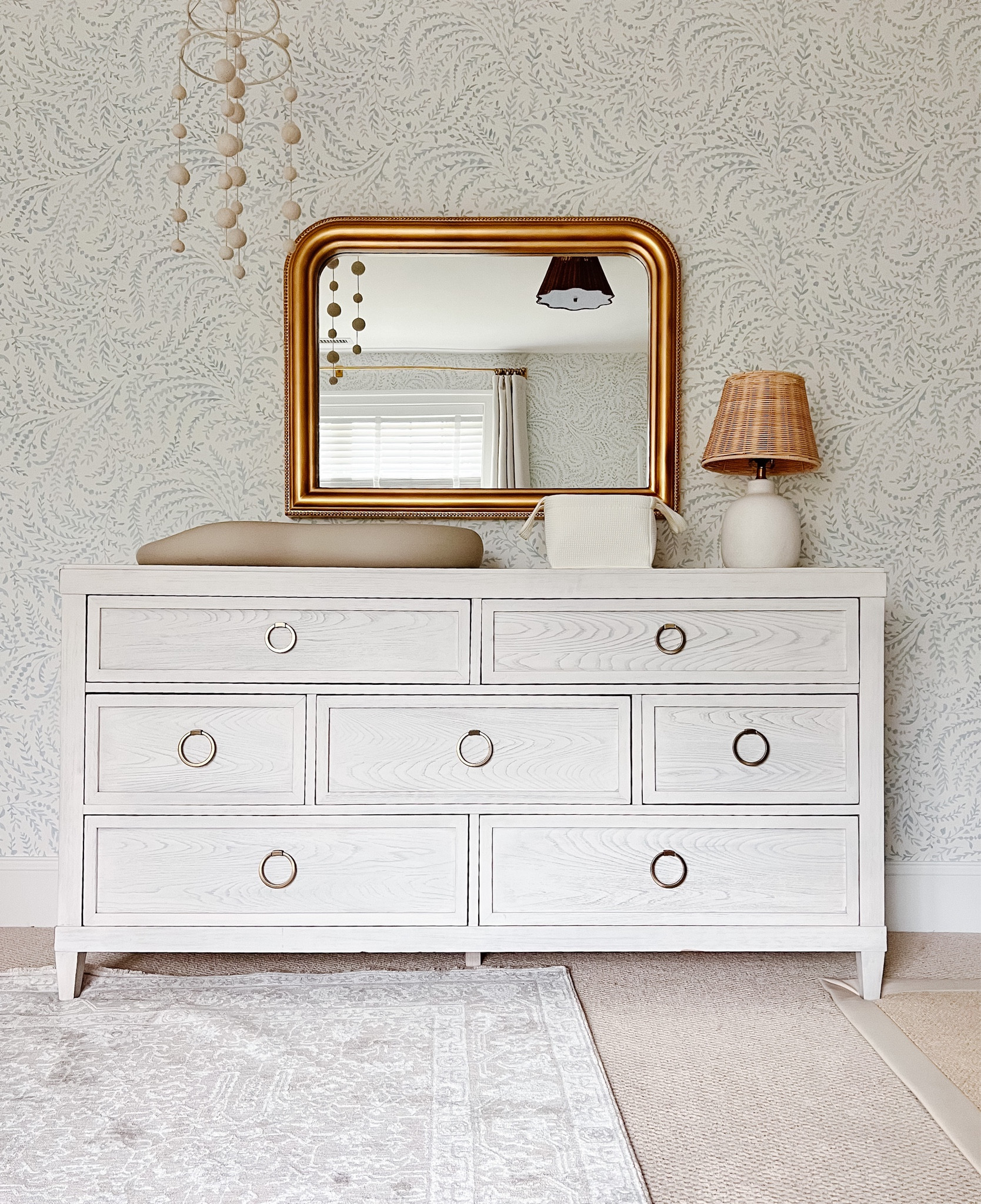 Sweet baby girl nursery with hints of blue in this Serena and Lily Priano wallpaper. Touches of brass and a neutral palette make this a room she can grow into. 

Shop the look and follow @pennyandpearldesign for more interior design and home style.



#LTKstyletip #LTKbaby #LTKhome